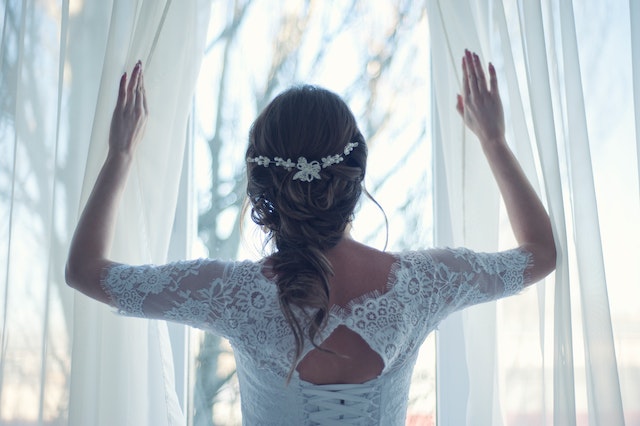 A bride and a dress.