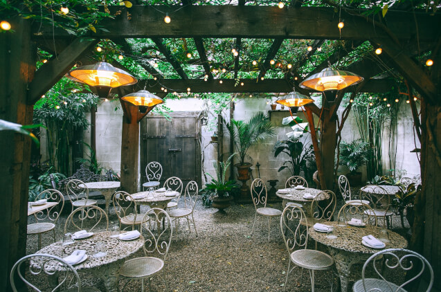 An outdoor venue with plenty of seating options and natural elements